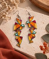 Boucles artisanales “ oiseaux géométriques vert”