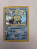 Carte Pokémon Gyarados Holo N. 136 bon état.