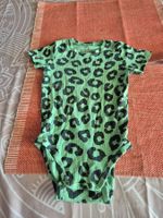 Tolle Body von Lindex Leo Print Grösse 86 guter Zustand.