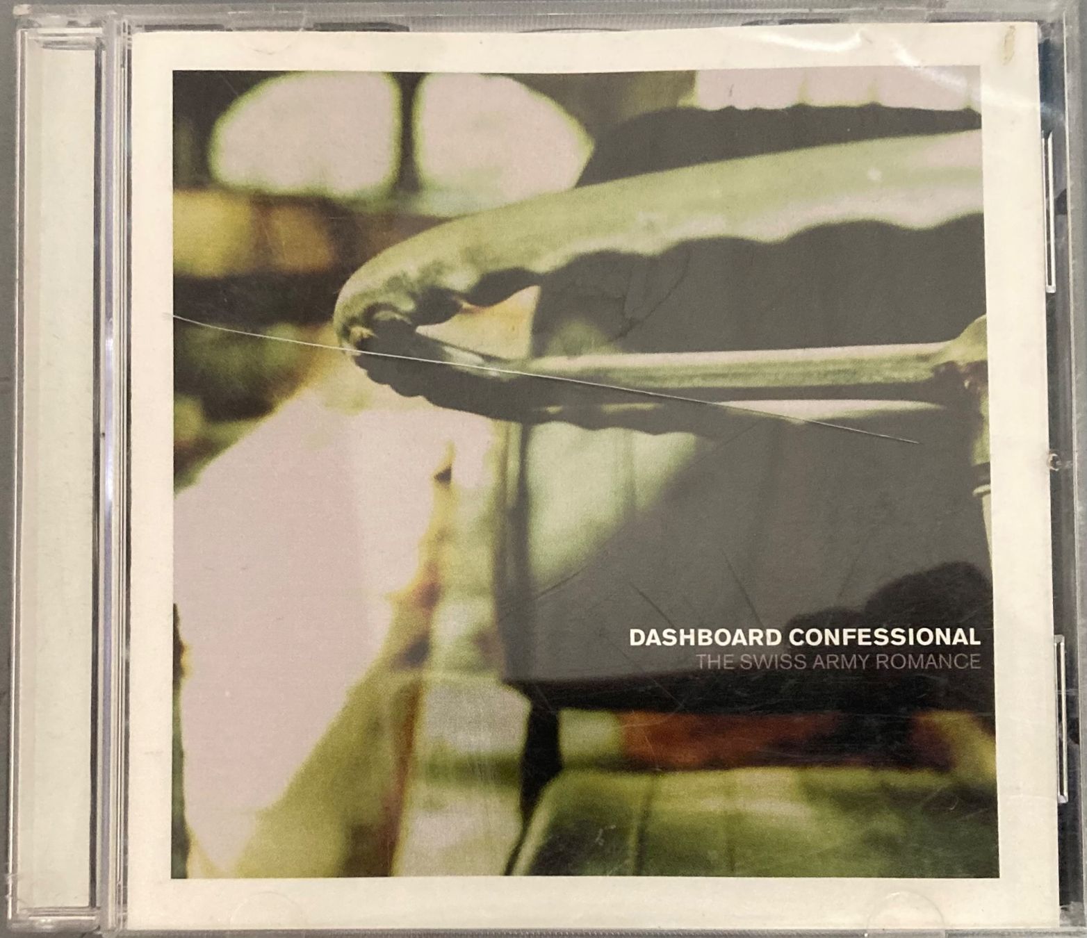 CD: DASHBOARD CONFESSIONAL - THE SWISS ARMY ROMANCE – Usato da Poliez-Pittet venduto da Newtown-Records