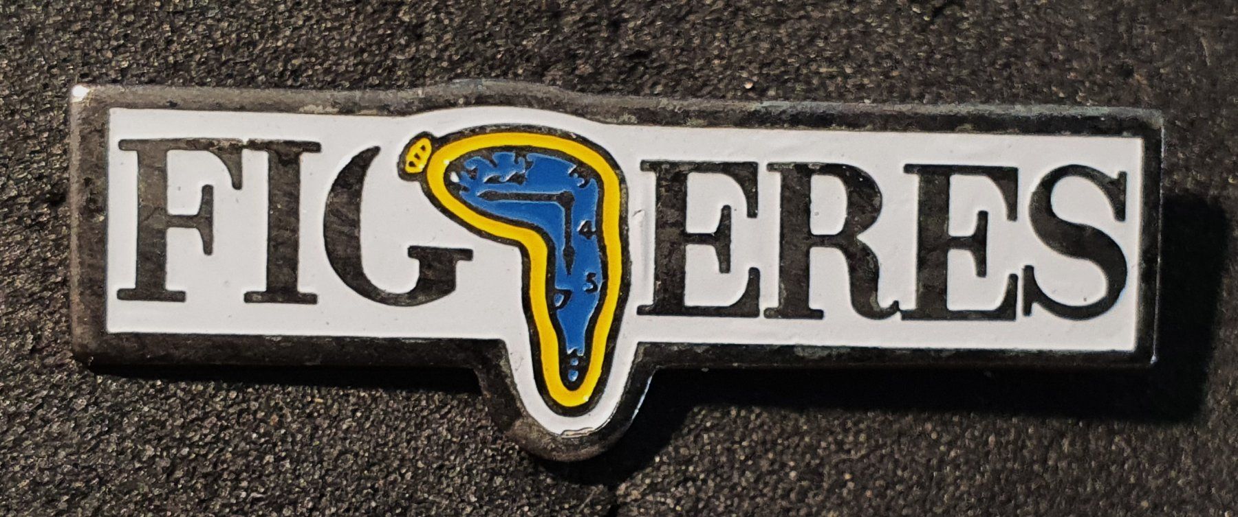 Placchette & Badge: CC448 - Pin Wappen Figueres Uhr – Usato da Reinach BL venduto da Boston-Verkauf