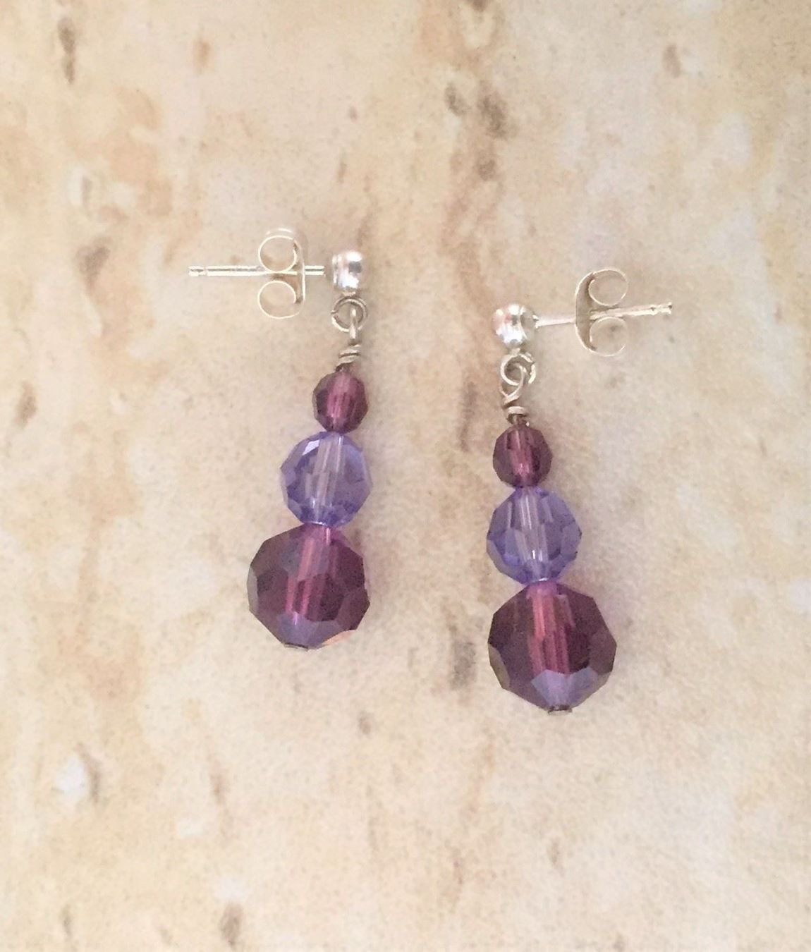 Ohrringe & -stecker: Boucles oreilles Ag & Swarovski violet / Ohrstecker Silber – Neu und originalverpackt aus Goumoens-la-Ville von brandonv