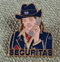 D678 - Pin Securitas Frau Telefon  -  goldig