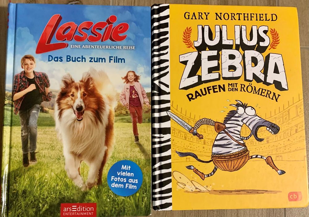 Bücher: "Lassie" und JULIUS ZEBRA "Raufen mit den Römern" – Neu (gemäss Beschreibung) aus Laufen von Gwitterchischte