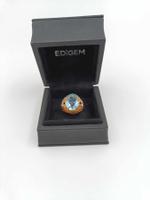 GÜBELIN AQUAMARIN 7.00 CT. IN GEFLOCHTETEM 750 GOLDRING
