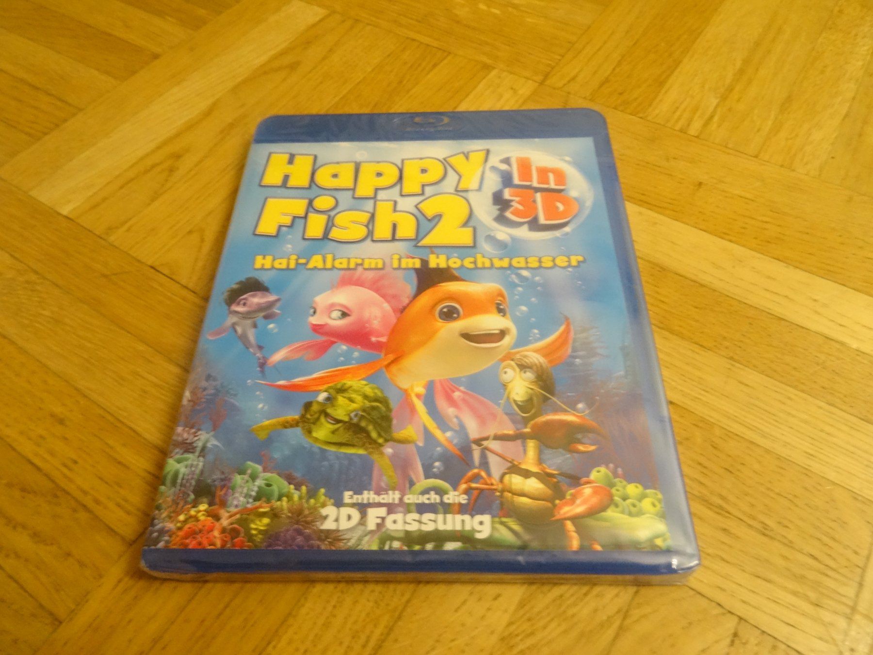 Tutti i DVDs: Happy Fish 2 BLU-RAY – Nuovo e nell'imballaggio originale da Olten venduto da Disc-Verkauf