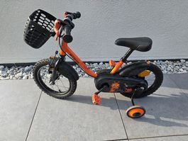 Vélo enfant B'Twin 14 pouces orange avec roulettes bon état 