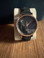Montre quartz cadran noir bracelet silicone état neuf