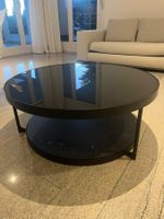 Moderner runder Couchtisch in Schwarz mit Glasplatte