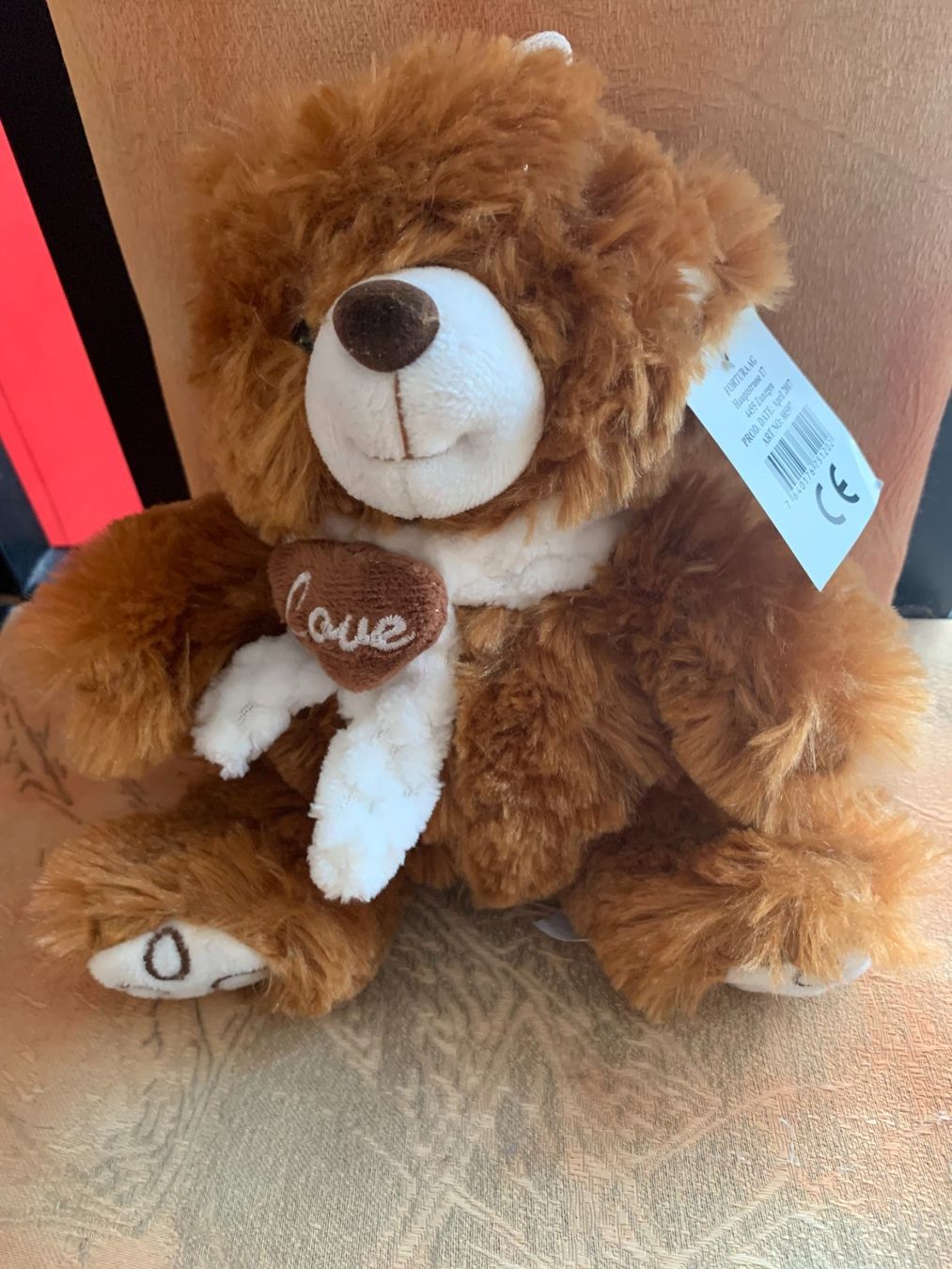Jouets: Plüsch Teddybär mit Herz – D'occasion à Reinach BL par jessihome