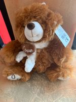 Plüsch Teddybär mit Herz
