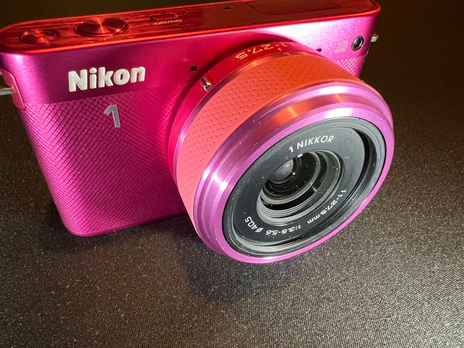 Nikon Fotocamera: Nikon 1 J2 mit Zoom Objektiv – Usato da Uster venduto da Stoessda 1