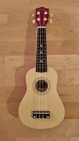 Ukulele hellbraun rot guter Zustand