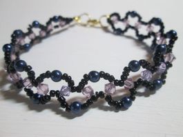 Schmuckstück Wellenarmband mit rosa glitzernden Swarovski un