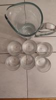 Trinkglässer mit Wasserkrug