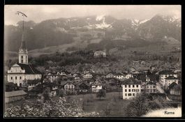 AK Kerns, Dorfansicht mit Kirche und Bergkulisse