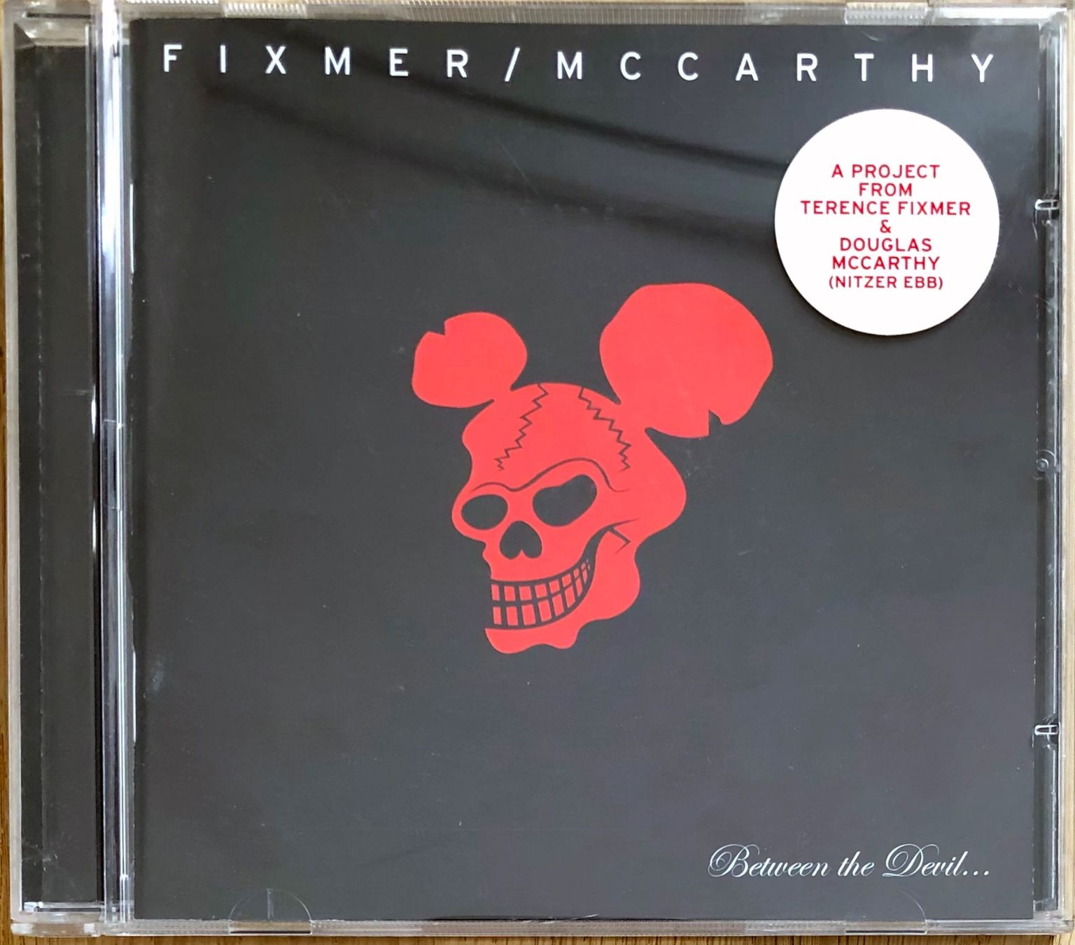 CD: Fixmer/McCarthy – Between The Devil... – Usato da Martigny venduto da jereq