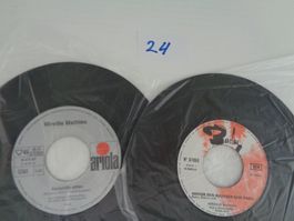 11 Vinyl Singles -2x M. Mathieu - 4x Adamo - 5x Mary Roos
