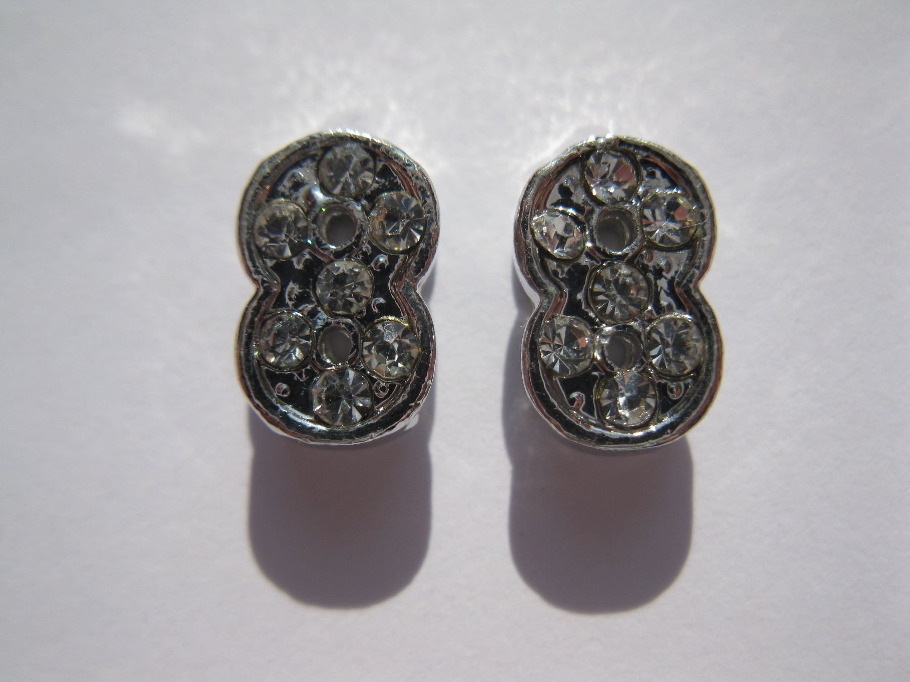 Perle (finte): 2 Schiebeperlen mit Strass infinity, 11mm – Nuovo e nell'imballaggio originale da St. Margarethen TG venduto da LuanaKa