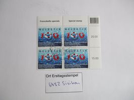 Viererblock mit Ort Ersttagsstempel 6452 Sisikon