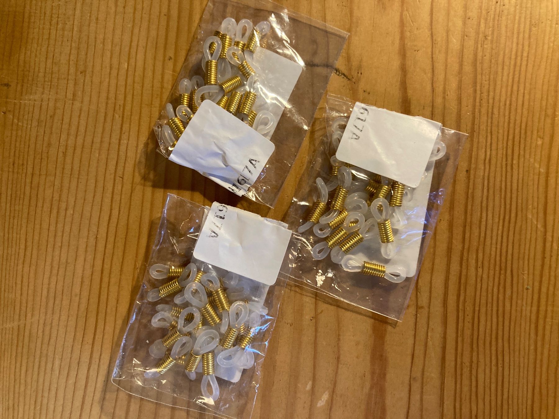 Occhiali & Lenti: 60 Brillenbandgummis transparent gold – Nuovo e nell'imballaggio originale da Luzern venduto da nisssa 1