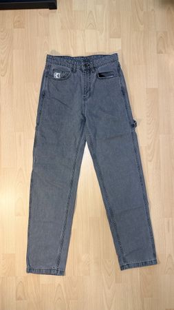 Pantalon gris Karl Kani taille 36/38 EU