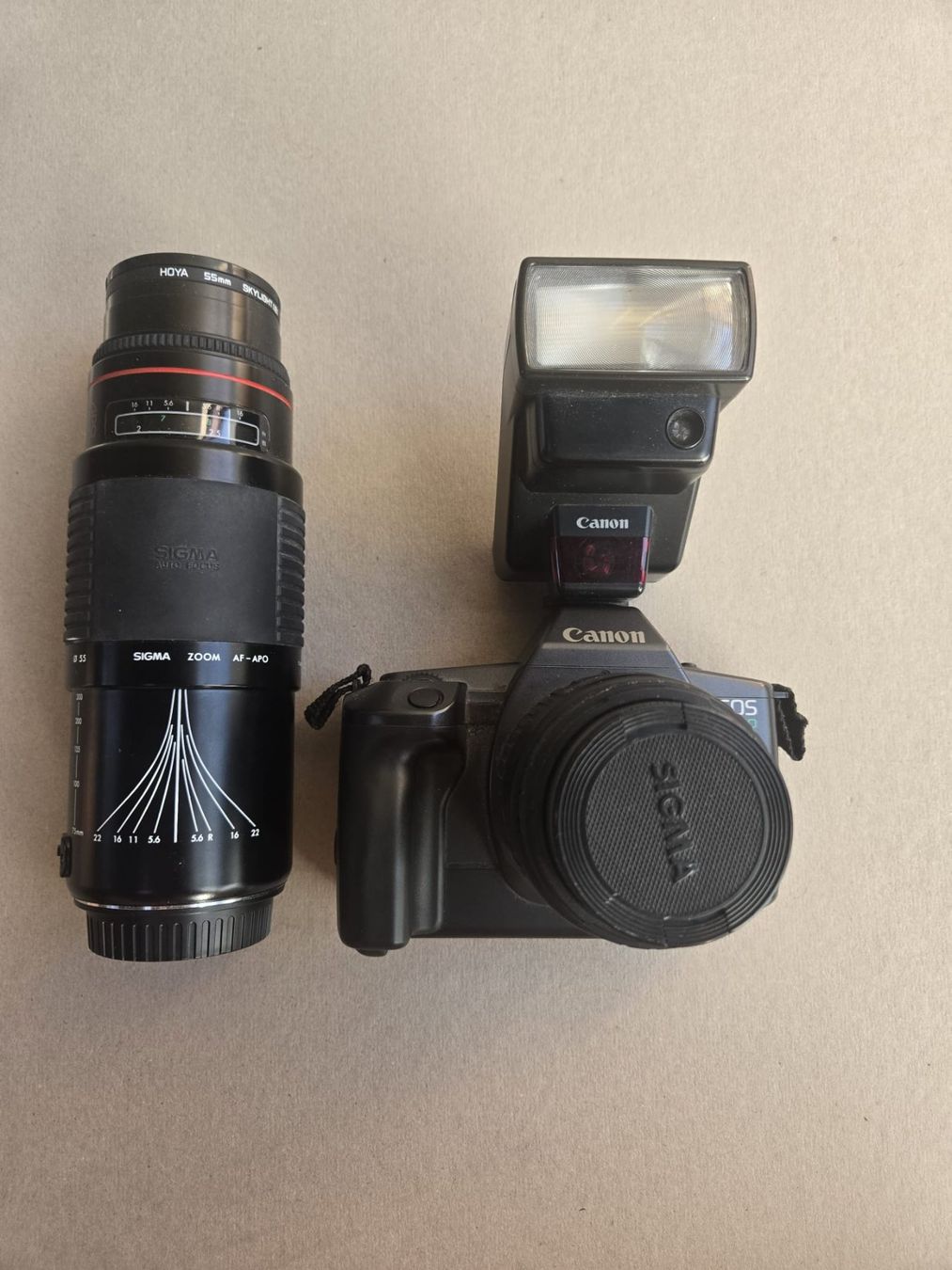 Canon Fotocamera: Canon EOS 600 analog mit Sigma Zoom Objektiv und Blitzgerät – Usato da Hunzenschwil venduto da Hardrock6