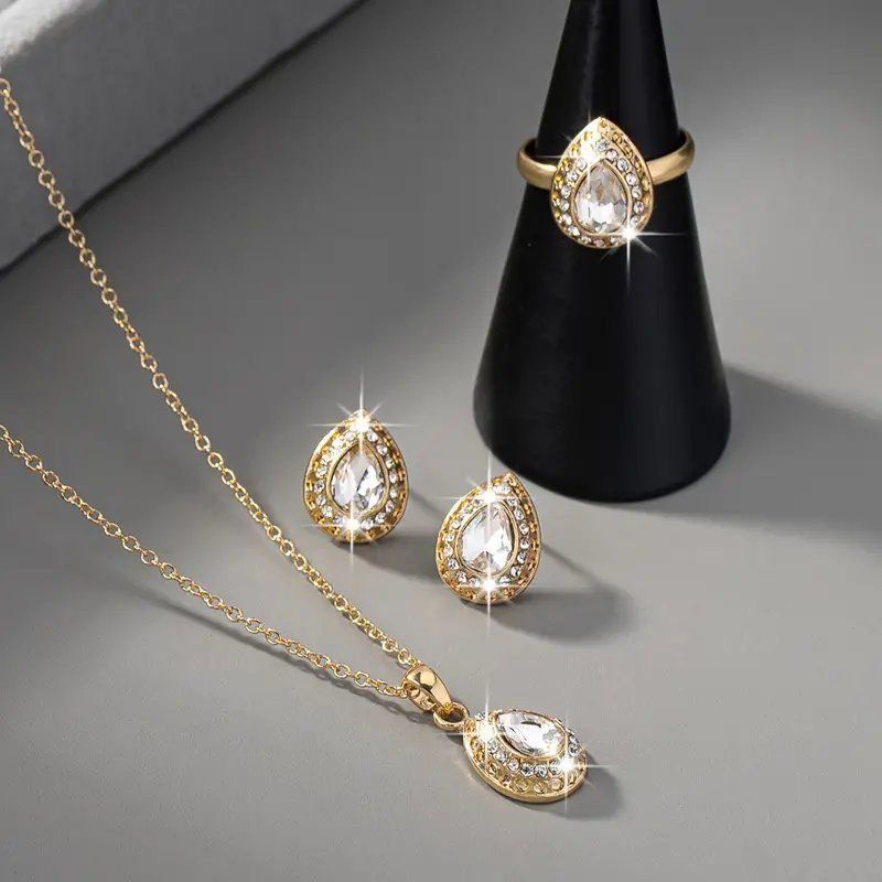 Catenine: 18k Kette, Ohrringe, und Ring mit Strass Steinen – Nuovo e nell'imballaggio originale da Glattbrugg venduto da majuska01