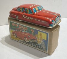 "NEW X CAR" Blechauto in OVP/voiture en fer blanc