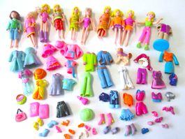 10 Plastikpuppen mit Gummikleidung