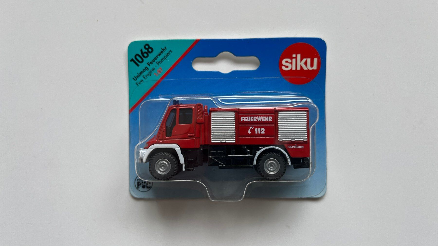 Siku Modellini d'auto: SIKU 1068 / Unimog Feuerwehr – Nuovo e nell'imballaggio originale da Wauwil venduto da swissGadgets