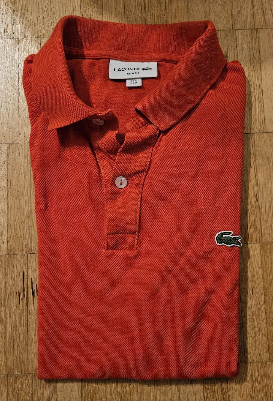 Lacoste Magliette Polo: Lacoste Shirt orange (gebraucht) – Usato da Grenchen venduto da Manuel.We