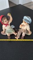 Statuettes  garçon et fille vintage en céramique.