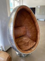 Eiförmiger Sessel im Industriestil, braun Lederbezug