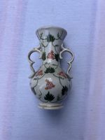 Petit vase décoratif vintage avec des fleurs peintes