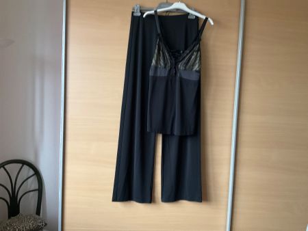 Très bel ensemble pantalon et bustier neuf t.38 Triumph