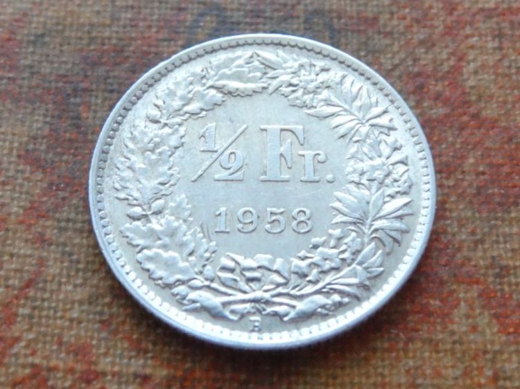 Tutti le monete: 1/2 Fr. 1958  (B) – Usato da Romanel-sur-Lausanne venduto da Swift13