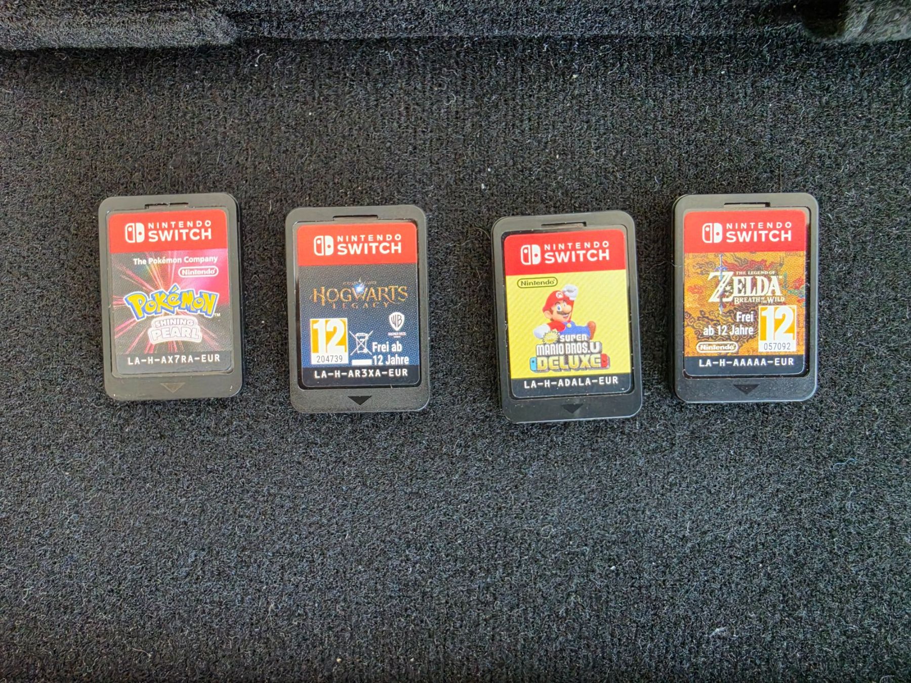 Nintendo Konsolen: Nintendo Switch OLED + 4 jeux + Poche Rangement – Neu (gemäss Beschreibung) aus sion von Romain_Rpk89 1