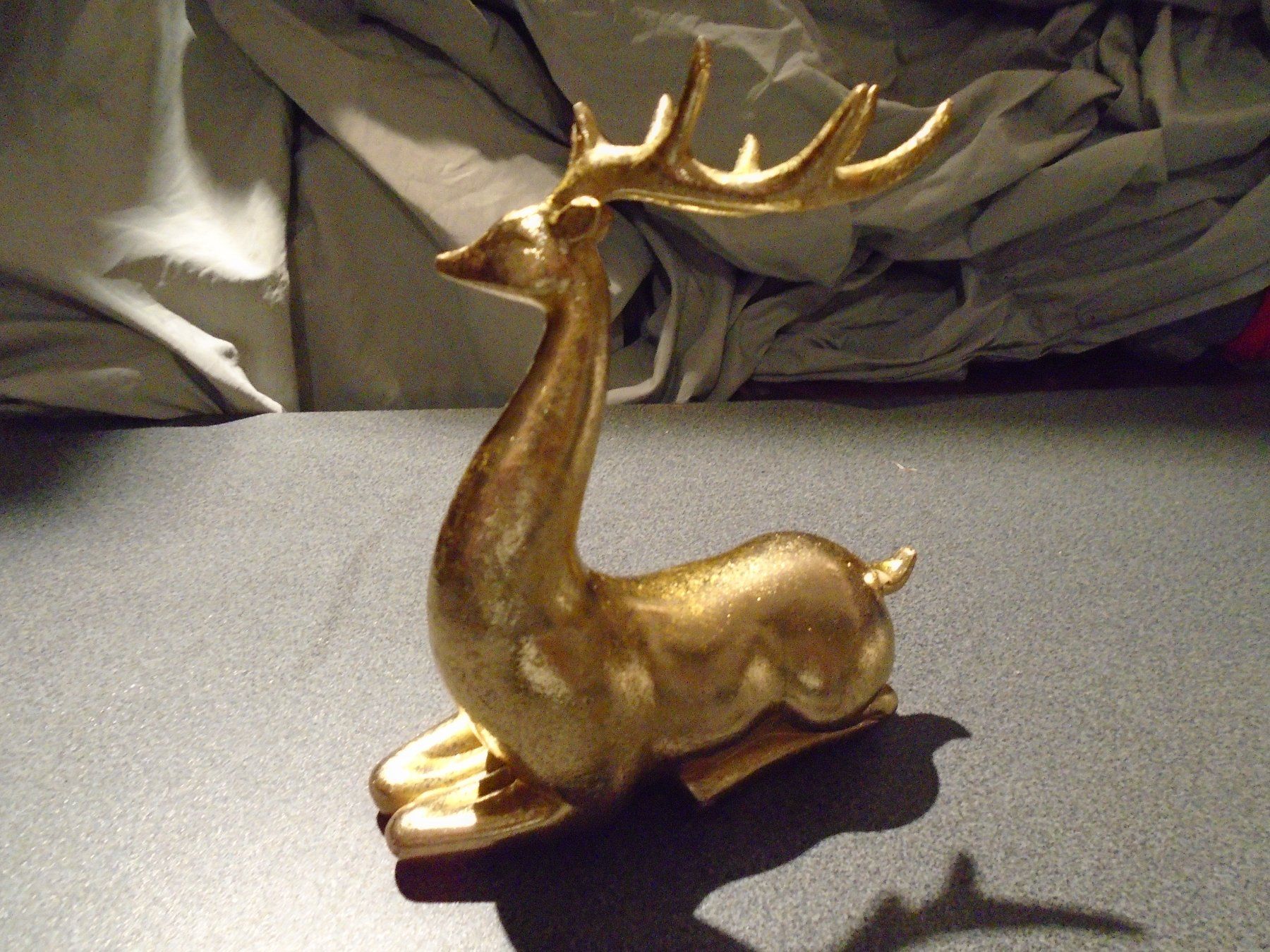 Statuette: Hirsch goldfarbig, liegend – Usato da Zürich venduto da abraxas1291 1