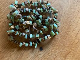 Armkette mit Gummizug und Natursteinen (evtl. Tigerauge)