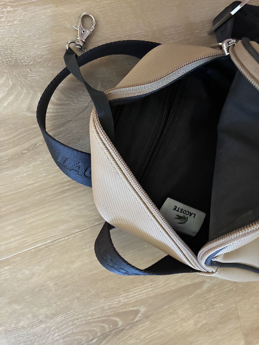 Lacoste Sonstige Kleidung & Accessoires: Sacoche Lacoste beige petit format bon état – Gebraucht aus Chénens von Picco82 1