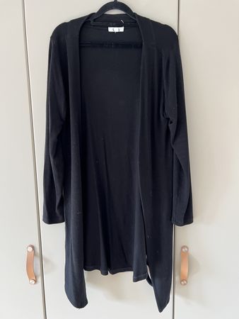 Long sweater with cut out detail 