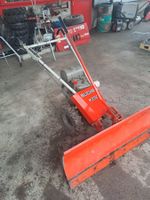 Bucher Motormäher M200 mit Schneepflug