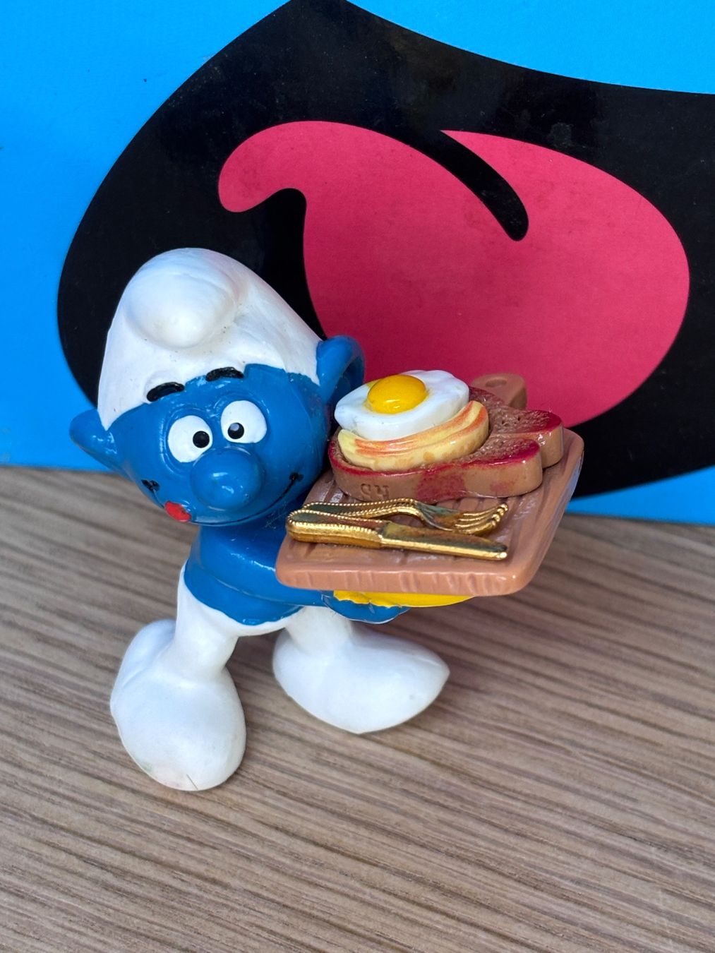 Statuette: Schlumpf mit Frühstücks-Toast – Usato da Lyss venduto da Duckszone