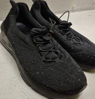 Damen Sneaker schwarz mit Glitzersteinen.