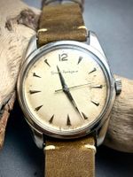 Montre homme Girard-Perregaux vintage argent et cuir brun