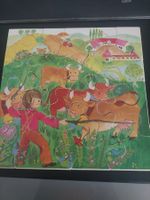 Puzzle mit Bauernhofmotiv und Kühen 16 Teile