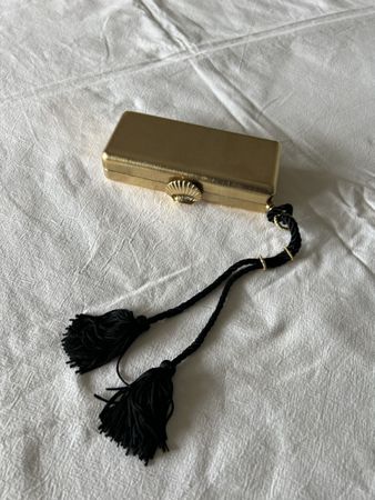 Goldene Clutch mit Quasten, gebraucht