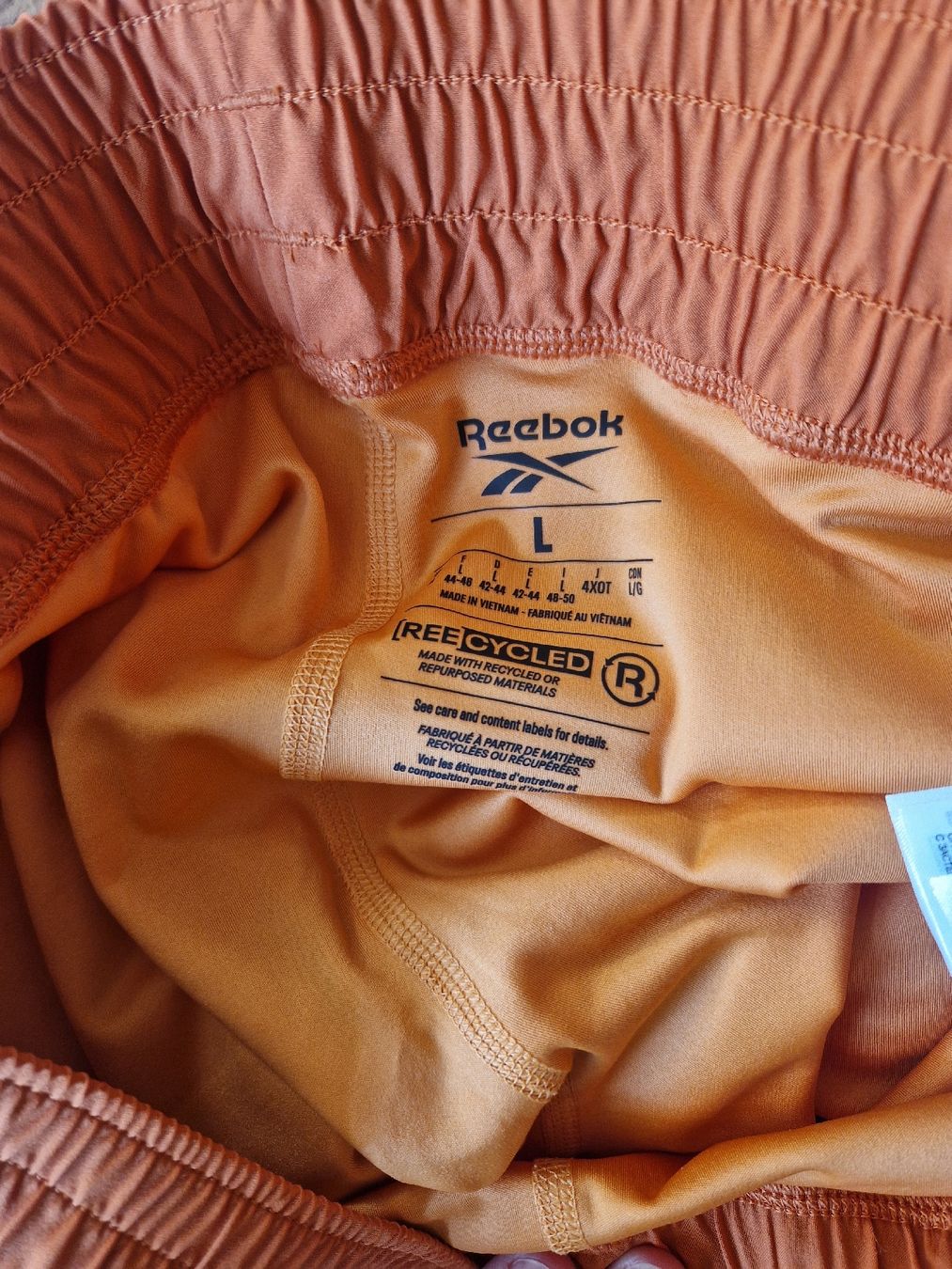 Reebok Pantaloni: Reebok Laufshorts Grösse L orange – Usato da Basel venduto da AvideZa 1
