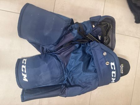 Pantalon de hockey CCM, bleu marine, taille L, bon état